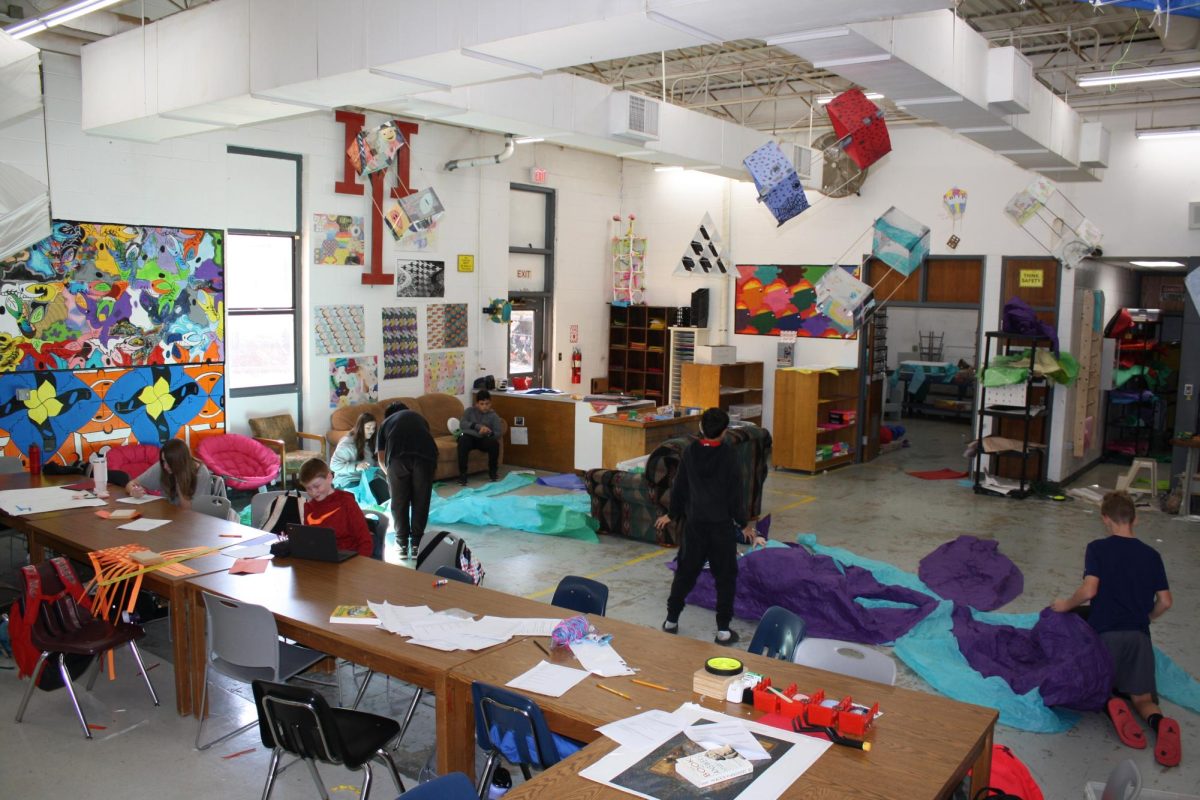 Kids in Gifted working on their balloons projects.